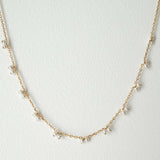 Elegant pearl necklace showcasing lustrous pearls, perfect for formal occasions and timeless style.