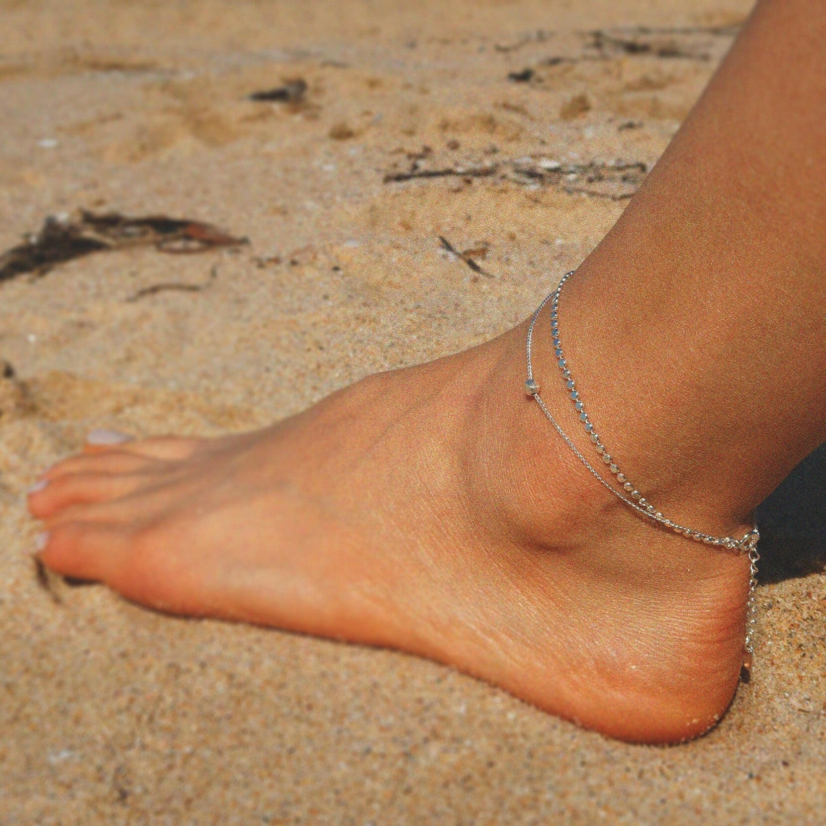 Elegant anklet featuring a dual chain design for a sophisticated layered look, perfect jewelry accessory