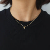 Solo wear: necklace centered on model