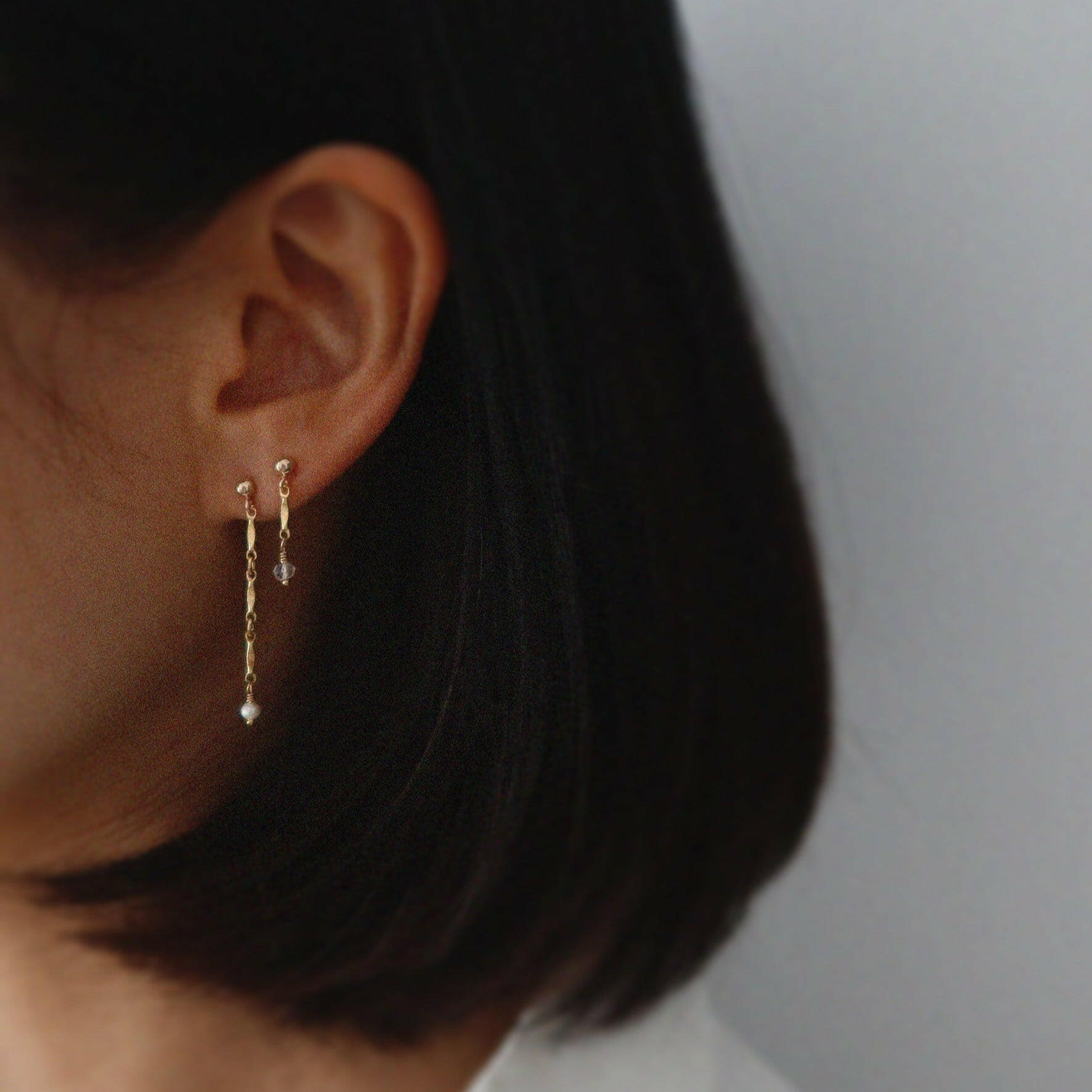 Model wearing Lydia Chain With Pearl Earrings, highlighting the elegant drop and pearl accents