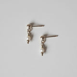 Petite gold drop earrings with small round freshwater pearl and gold posts