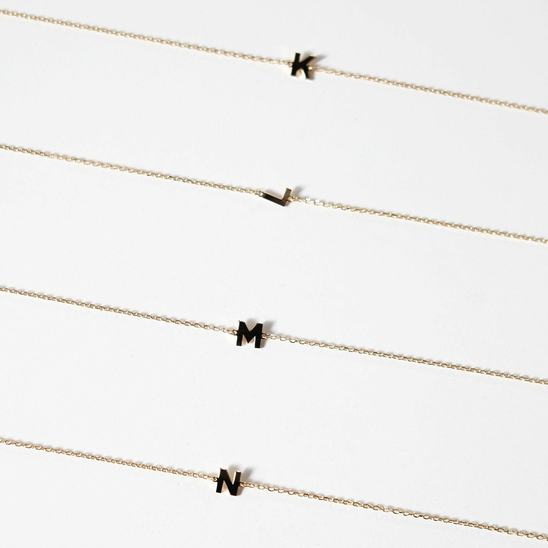 Initial bracelet featuring a minimal design, perfect as a dainty letter bracelet gift with simple and elegant style.