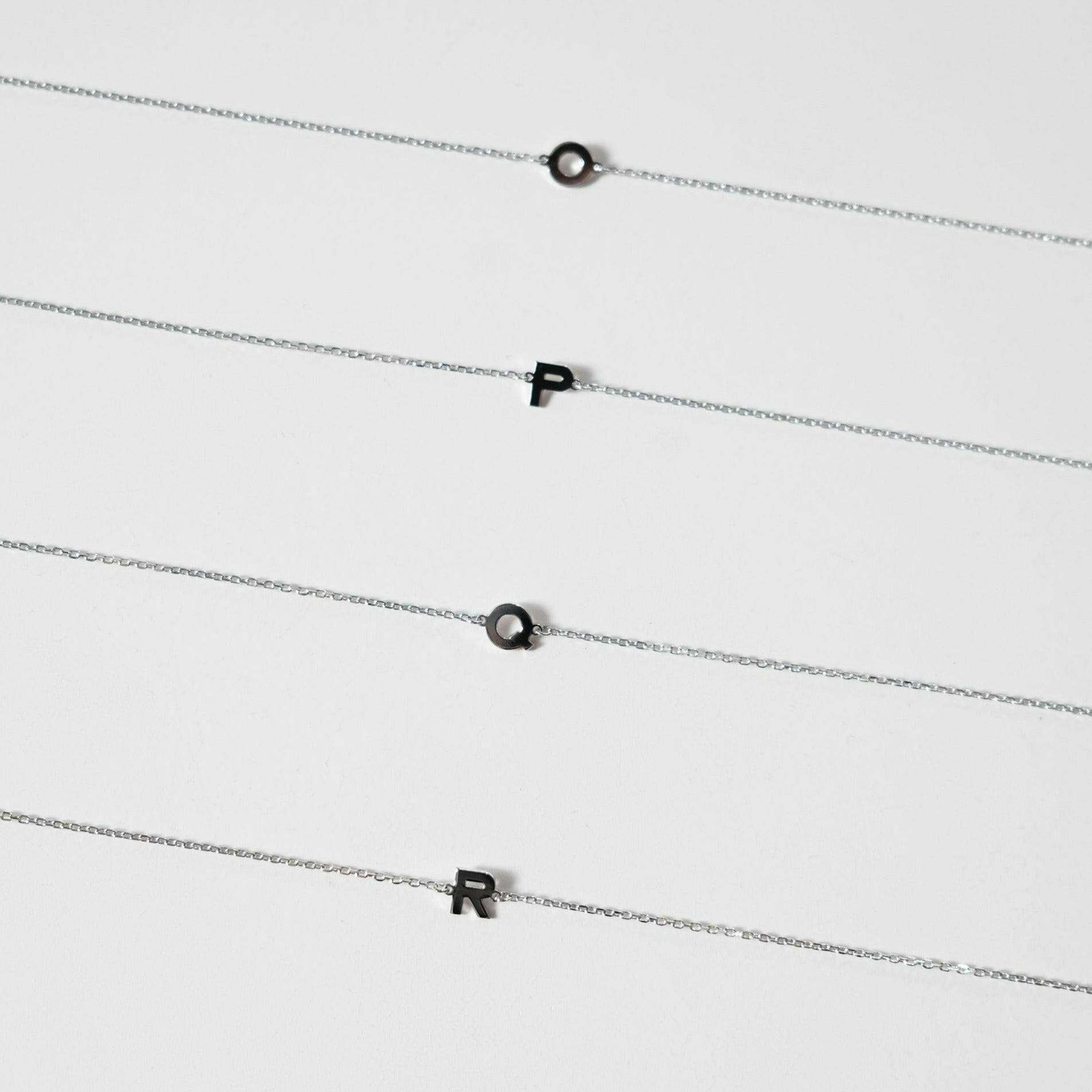 Initial bracelet featuring a minimal design, perfect as a dainty letter bracelet gift with simple and elegant style.