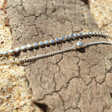 Elegant anklet featuring a dual chain design for a sophisticated layered look, perfect jewelry accessory