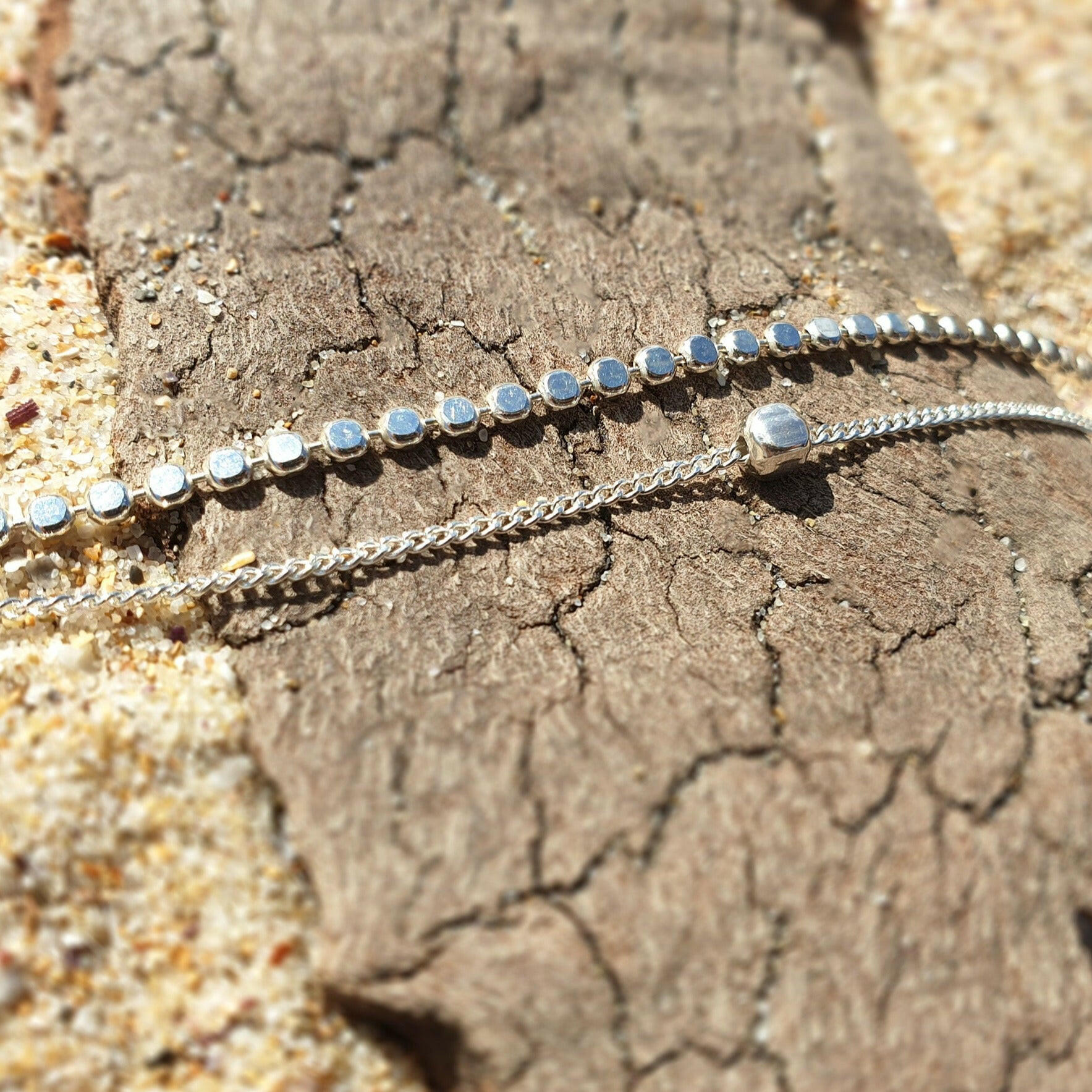 Elegant anklet featuring a dual chain design for a sophisticated layered look, perfect jewelry accessory