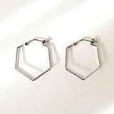 Modern chic hexagon dual lined hoops with simple elegant design, perfect for minimalist style and contemporary fashion.