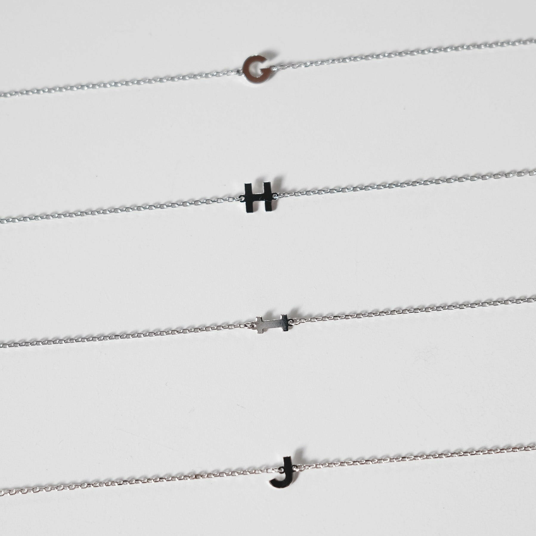 Initial bracelet featuring a minimal design, perfect as a dainty letter bracelet gift with simple and elegant style.