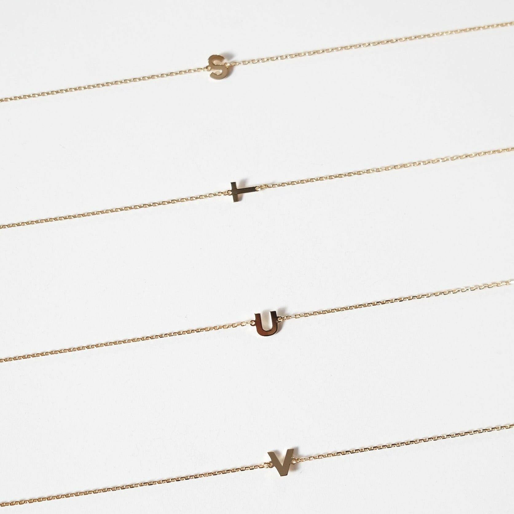 Initial bracelet featuring a minimal design, perfect as a dainty letter bracelet gift with simple and elegant style.