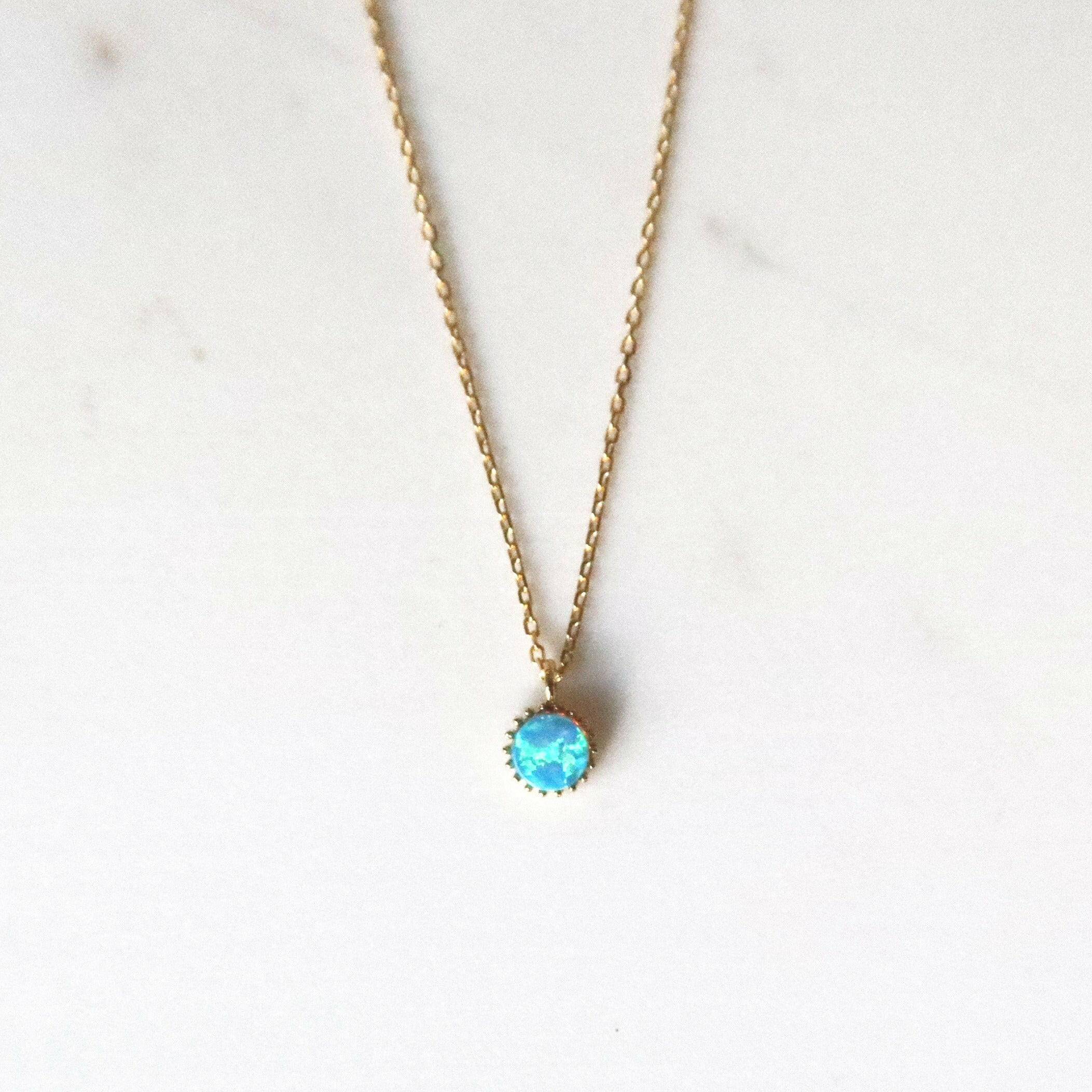 Elegant blue opal necklace pendant, perfect for a stylish and calming touch to elevate your look