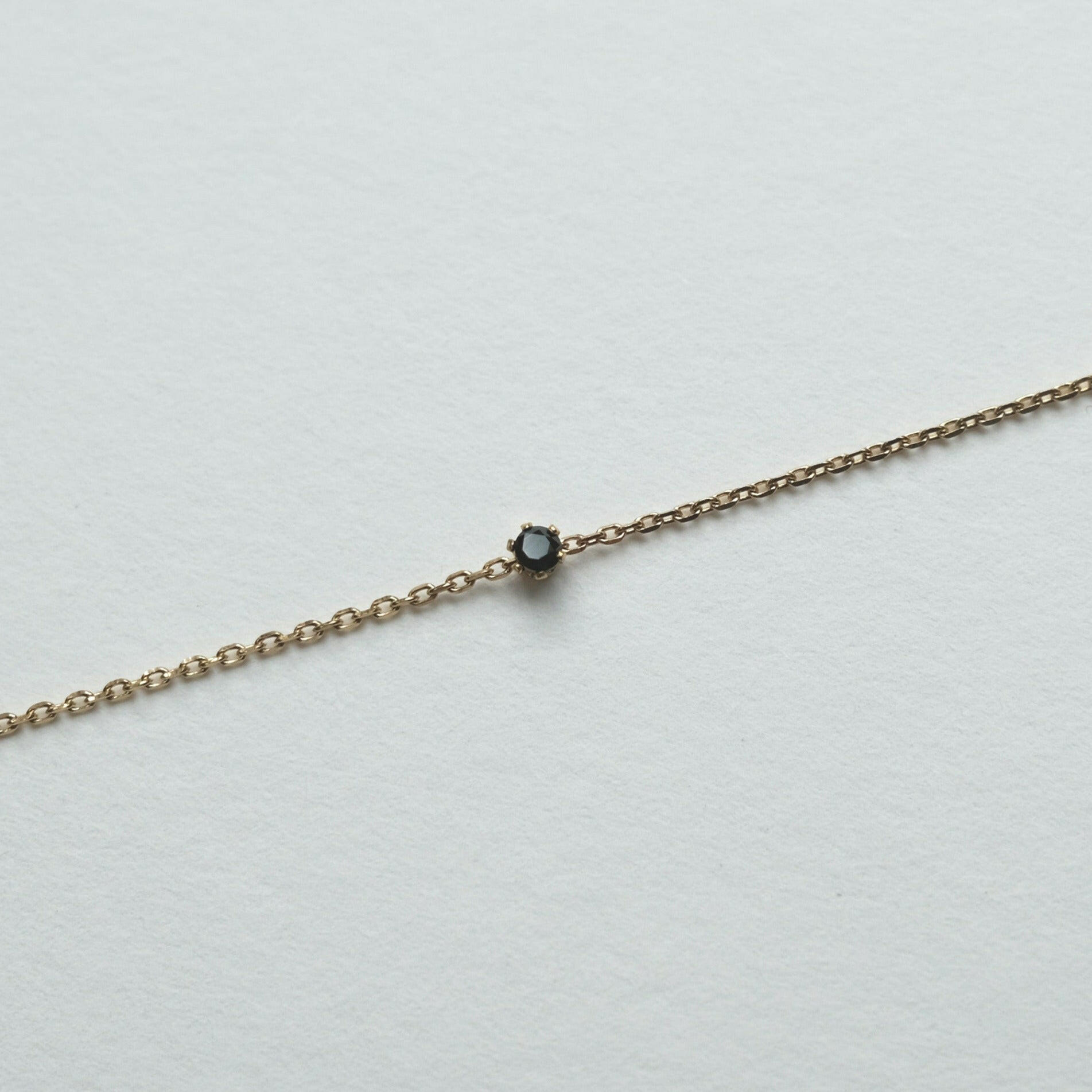 Petite crystal bracelet with minimal design featuring a delicate stone for elegant, understated style