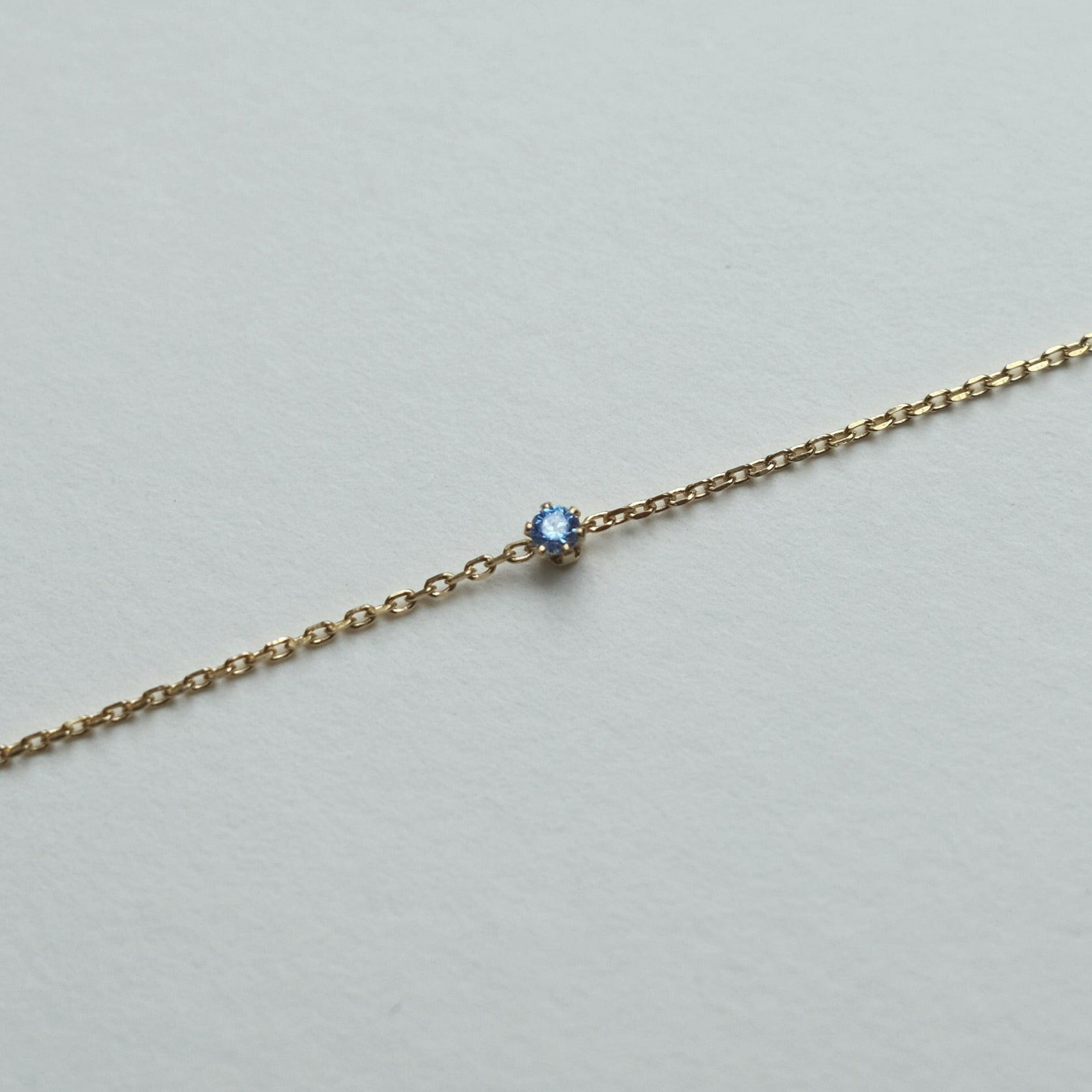 Petite crystal bracelet with minimal design featuring a delicate stone for elegant, understated style