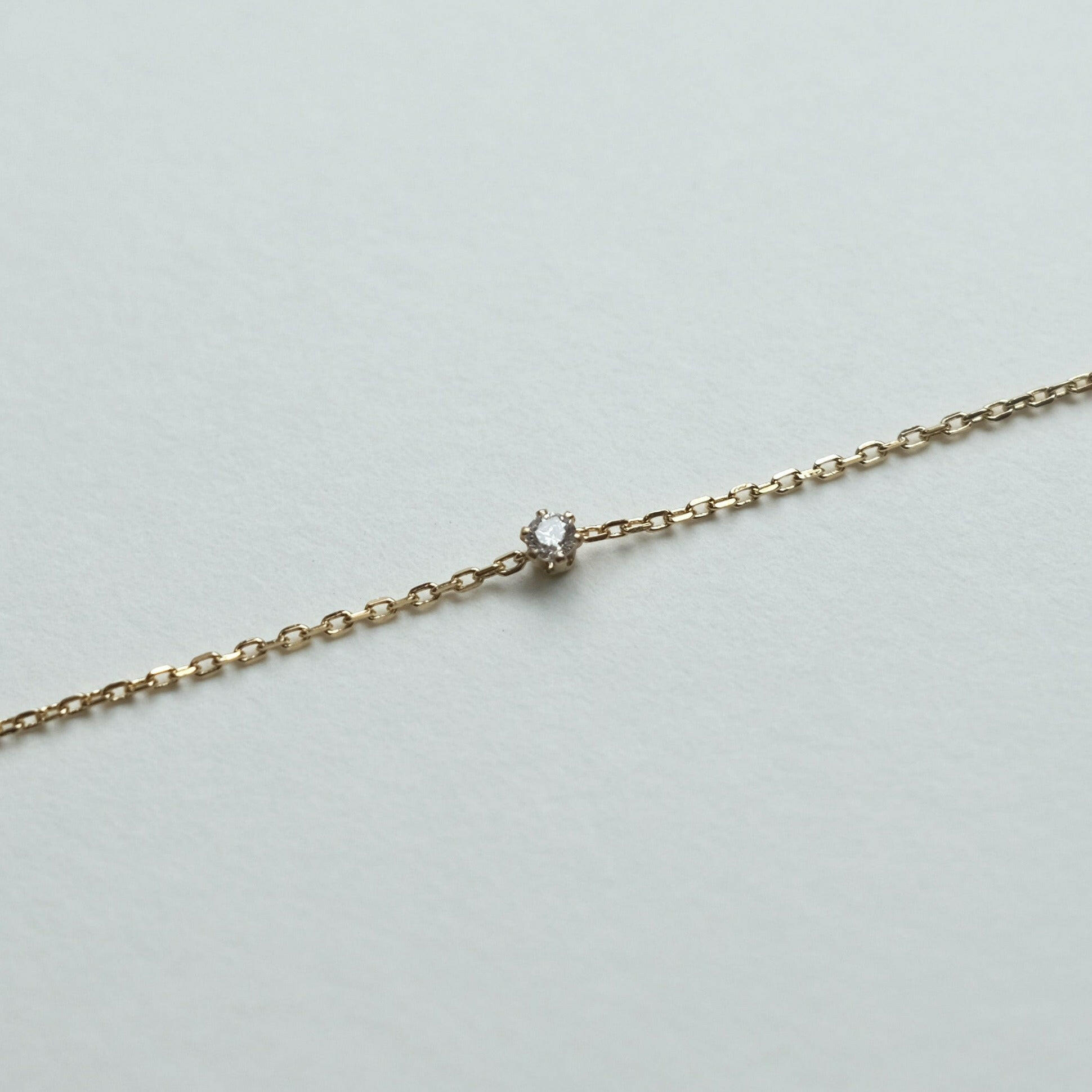 Petite crystal bracelet with minimal design featuring a delicate stone for elegant, understated style