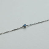 Petite crystal bracelet featuring a delicate stone and fine chain, perfect for elegant jewelry collections.