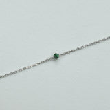 Petite crystal bracelet featuring a delicate stone and fine chain, perfect for elegant jewelry collections.