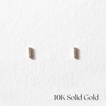 Front view of 10K Petite CZ Line Studs with slim gold bar design