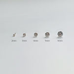 Five 14K gold crystal stud earrings displayed in ascending size order—2mm, 3mm, 4mm, 5mm, and 6mm—on a white background with labels beneath each earring for size reference
