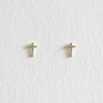 Gold cross-shaped studs with clear cubic zirconia inlay"