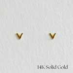 Minimalist Petite V gold studs shown from front angle