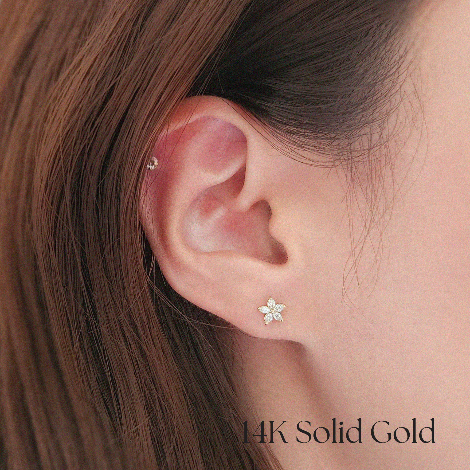 Model wearing Sparkle Fiore earrings for youthful floral charm