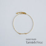 Gold filled bracelet on a light gray background with 'GOLD FILLED Tarnish Free' text.