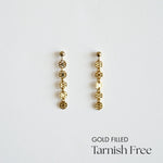 Gold-filled earrings on a light gray background with 'Gold Filled Tarnish Free' text.