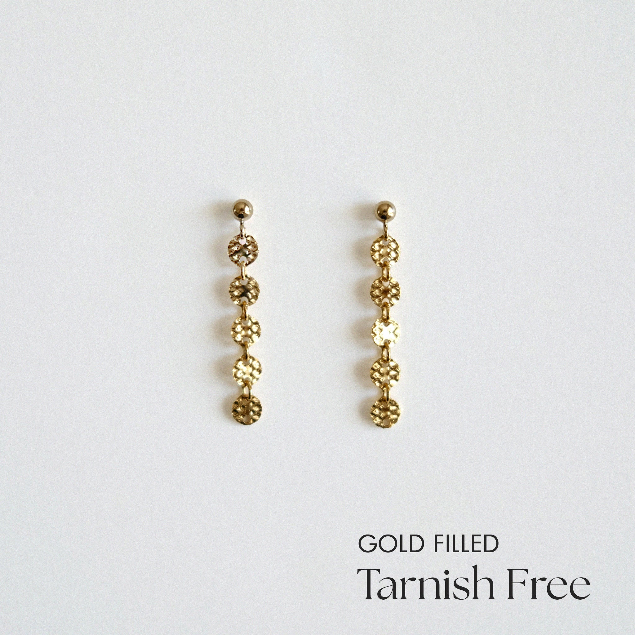Gold-filled earrings on a light gray background with 'Gold Filled Tarnish Free' text.