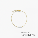 Gold filled bracelet on a white background with 'Tarnish Free' text.