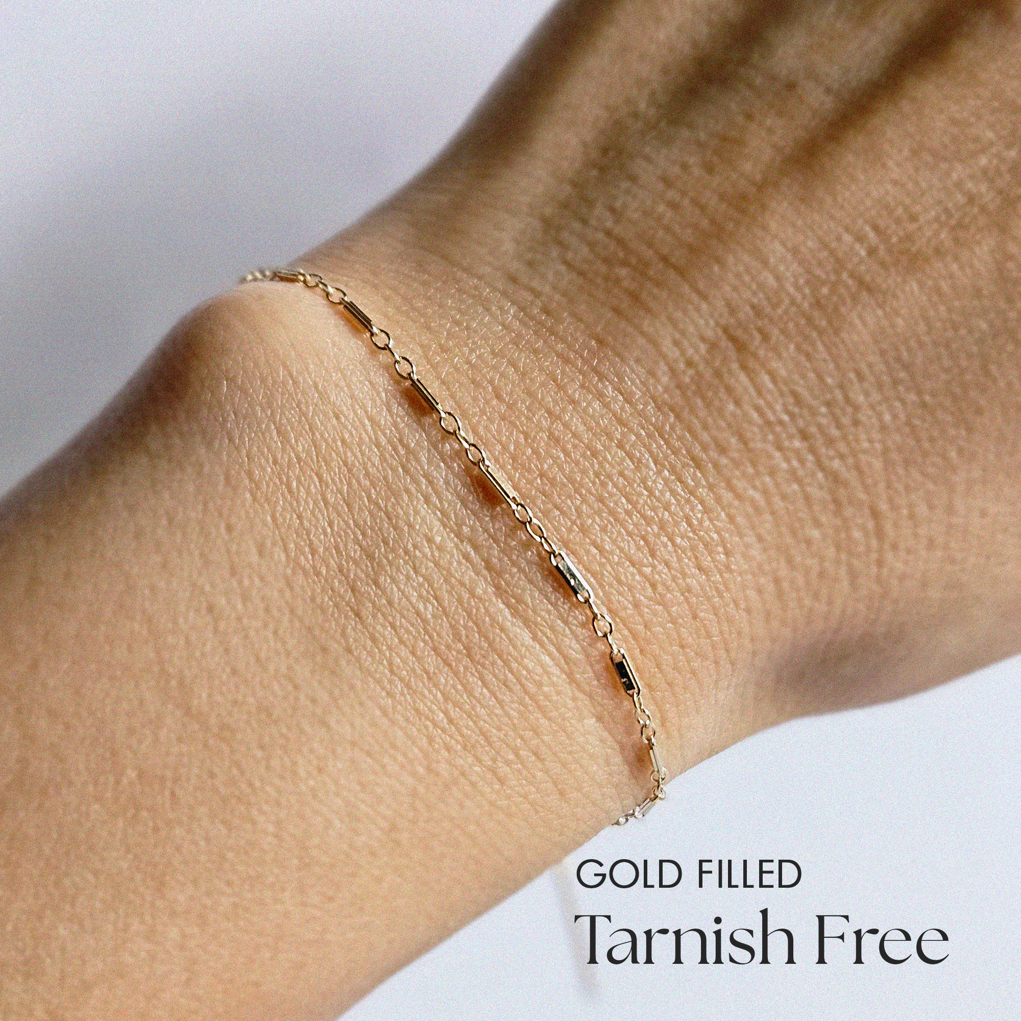 Model’s wrist with Bonbon Bracelet styled alone, viewed from above