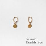 Front view of Celina Disc Earrings showing polished circular charms