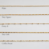 Comparison of different gold chain styles on a light gray background