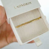 Gold chain bracelet in a 'LAONDRIM' jewelry box