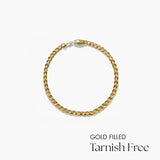 Gold filled bracelet on a white background with text 'Gold Filled Tarnish Free'.