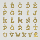 A to Z gold-filled initial charms displayed flat on a white surface.