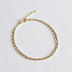 Simple chain bracelet displayed from top view, showing fine links and clasp