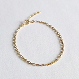 Simple chain bracelet displayed from top view, showing fine links and clasp