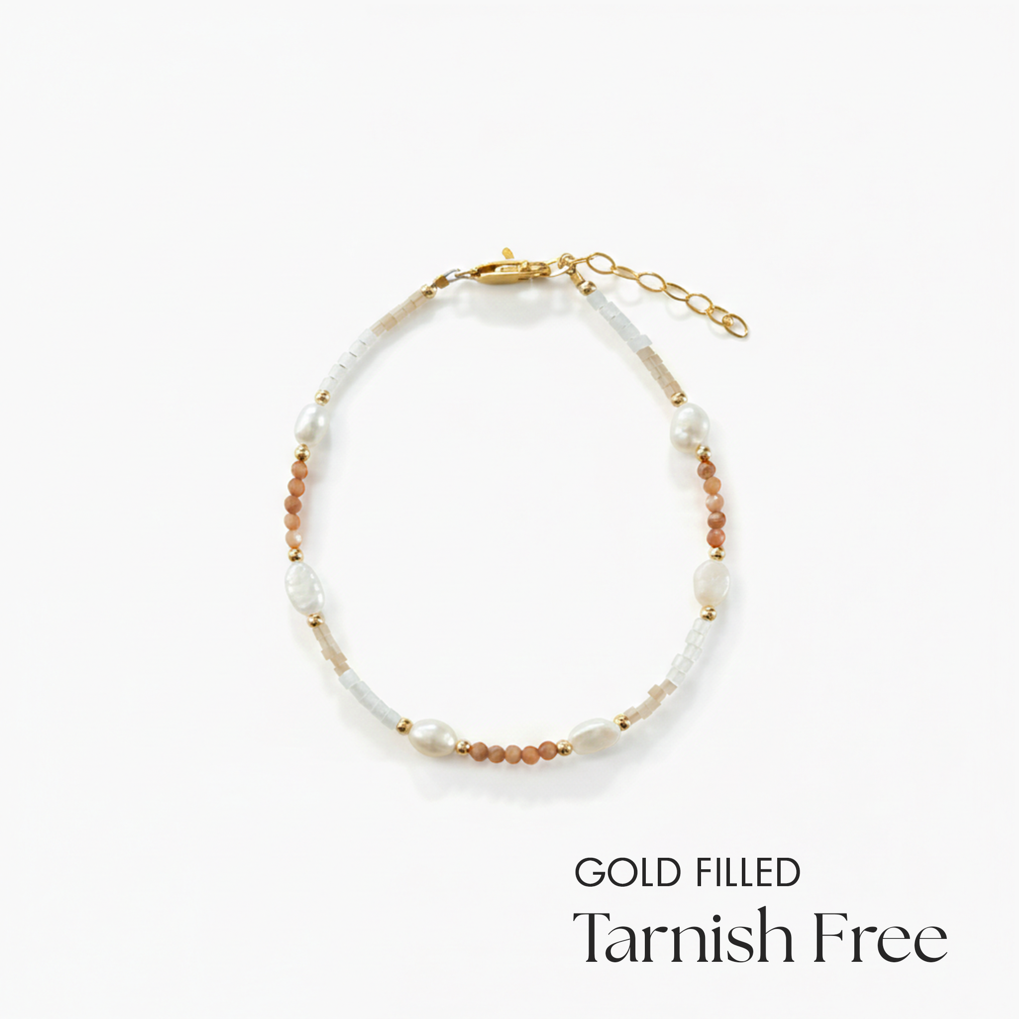 Gold-filled beaded bracelet on a white background with text 'Gold Filled Tarnish Free'.