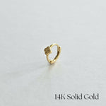 Side view of Lil Clover Huggie Hoop in 14K gold with crystal-studded clover charm