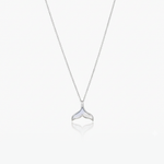 Silver whale tail necklace on a white background