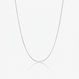 Silver box chain necklace on a white background