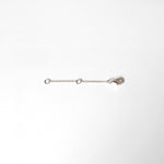 Sterling silver and gold chain extenders laid flat on white background with lobster clasps and O-rings visible