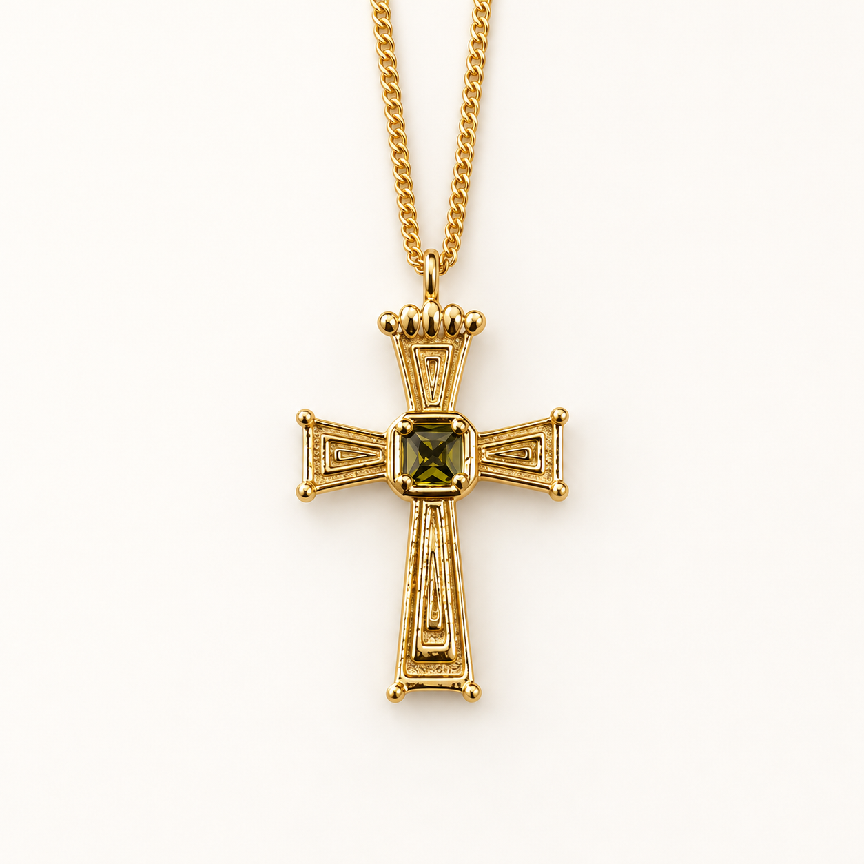 Eden Cross Necklace front view with ornate cross and olive-green centre stone