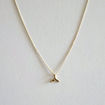 Dainty whale tail pendant with sleek chain, ocean charm jewelry inspired by marine life