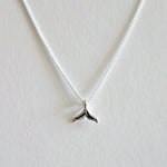 Dainty whale tail pendant with sleek chain, ocean charm jewelry inspired by marine life