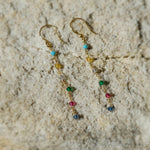 Rainbow hook earrings featuring colourful stones in an elegant chain drop style for vibrant, stylish accessories.