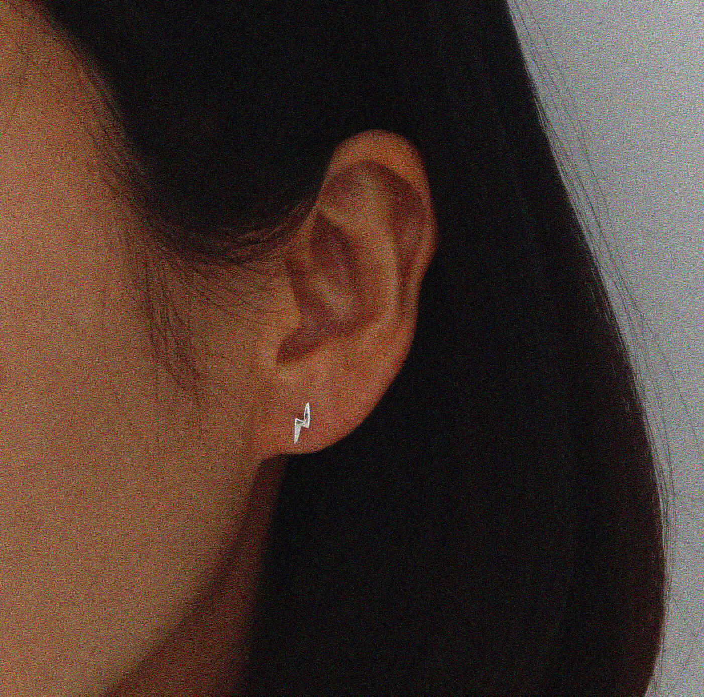 Sterling silver lightning bolt studs, tiny size, sleek and minimal design for elegant style